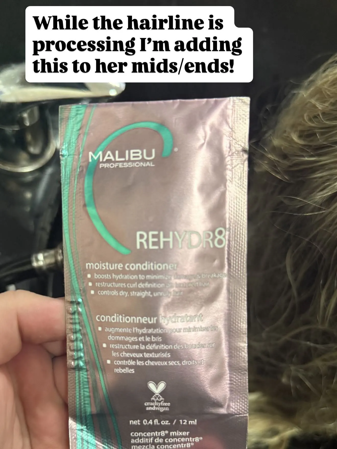 While the hairline is processing I'm adding this to her mids/ends — Malibu Rehydrate — Cosmetology by Cami, Hammond, Louisiana