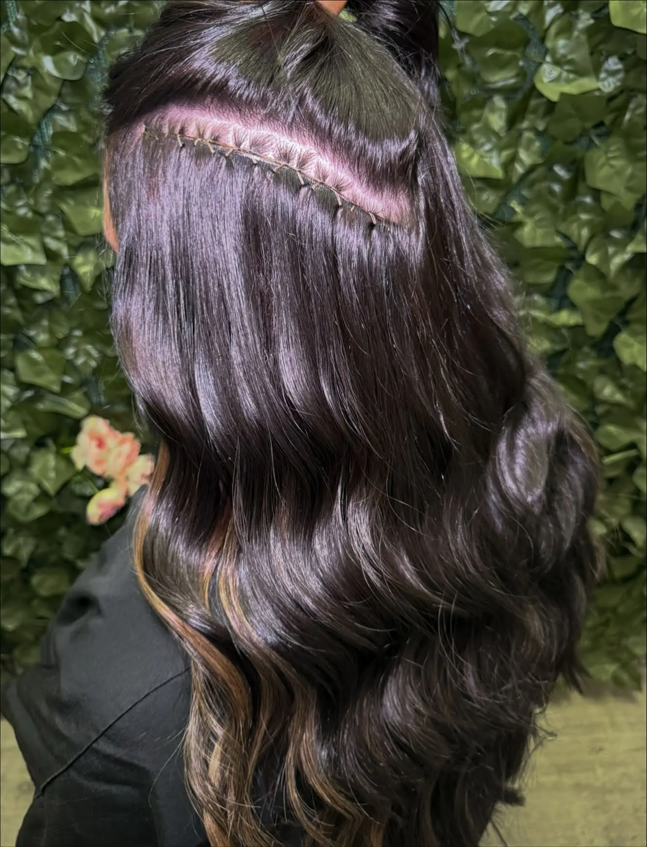 Hand-tied rows installed on a dark base, blended into the natural length — Cosmetology by Cami, Hammond, Louisiana