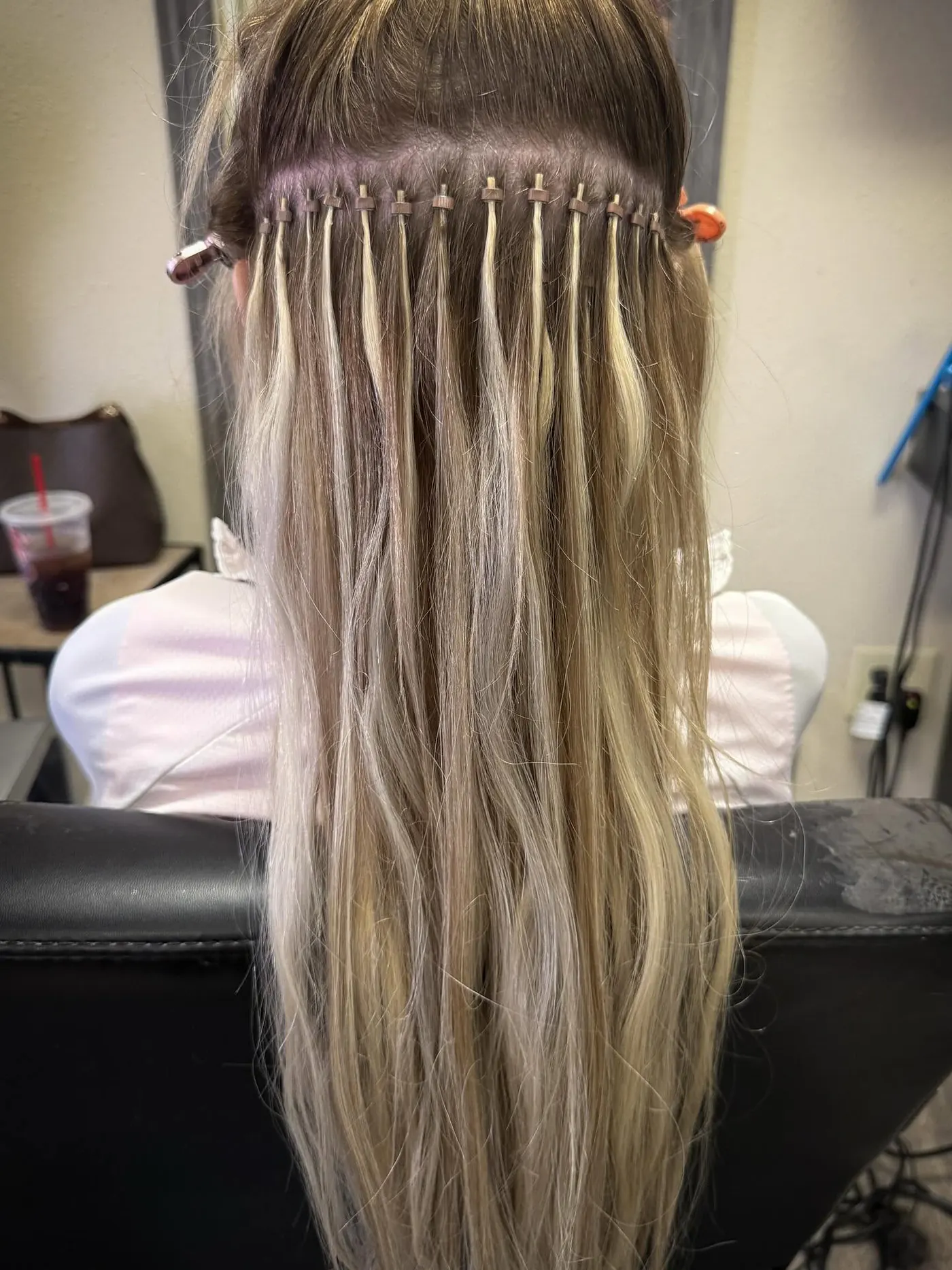 A beaded row install viewed from the back, before blending — Cosmetology by Cami, Hammond, Louisiana