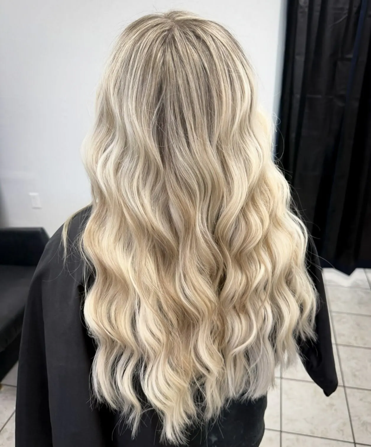 Long platinum waves with an even, bright tone — Cosmetology by Cami, Hammond, Louisiana